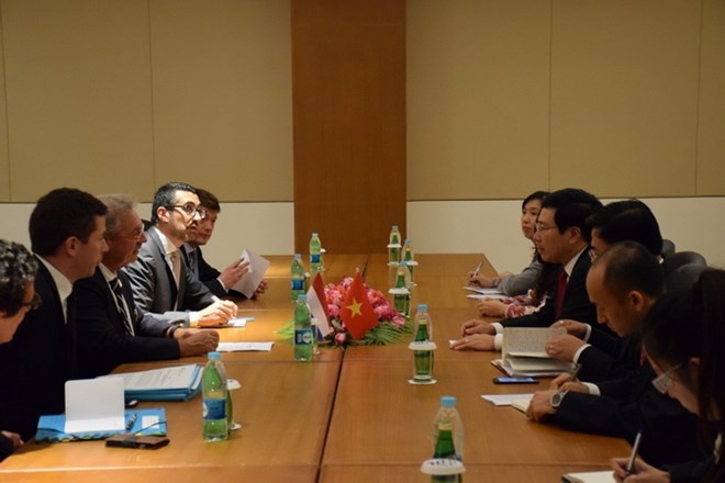 Phó Thủ tướng, Bộ trưởng Ngoại giao Phạm Bình Minh gặp song phương Bộ trưởng Ngoại giao Luxembourg Jean Asselborn. (Ảnh: Sơn Nam/TTXVN)